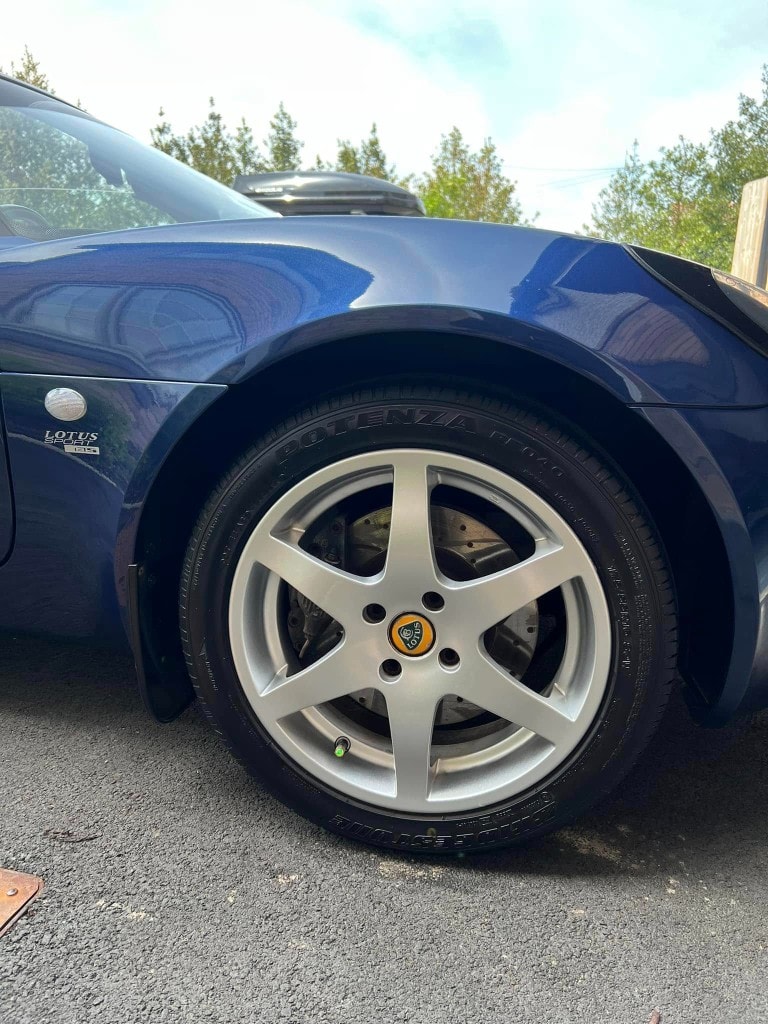 Blue Lotus Elise front wheel and arch after detailing