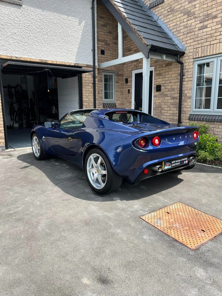 Blue Lotus Elise rear three-quarter, glossy finish