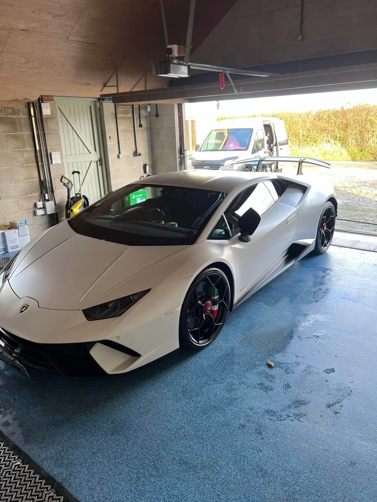 White Lamborghini Huracán detailed in the workshop